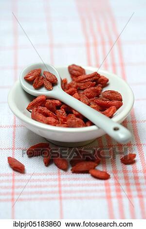 Stock Image - Dried goji berryberries in skin, common. Fotosearch