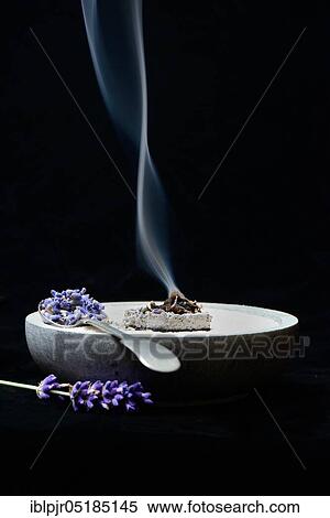Dried lavender flowers ( Lavandula angustifolia) are burned with the help of smoking coal, araomatherapy, smoking coal View Large Photo Image Stock Photography - Dried lavender flowers ( Lavandula angustifolia) are burned with the help of smoking coal, araomatherapy, smoking coal. Fotosearch