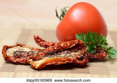 Stock Photo - Dried tomatoes, antipasti. Fotosearch