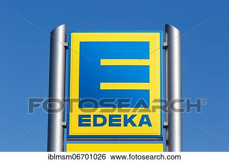 Edeka logo symbol sign supermarket food store shop, Germany, Europe View Large Photo Image Stock Photograph - Edeka logo symbol sign supermarket food store shop, Germany, Europe. Fotosearch