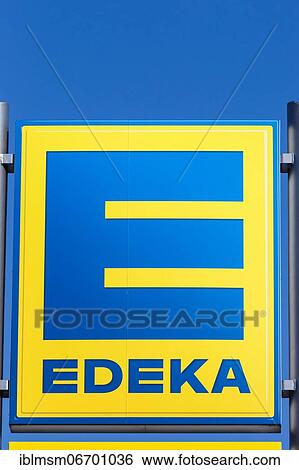 Edeka logo symbol sign supermarket food store shop, Germany, Europe View Large Photo Image Stock Photograph - Edeka logo symbol sign supermarket food store shop, Germany, Europe. Fotosearch