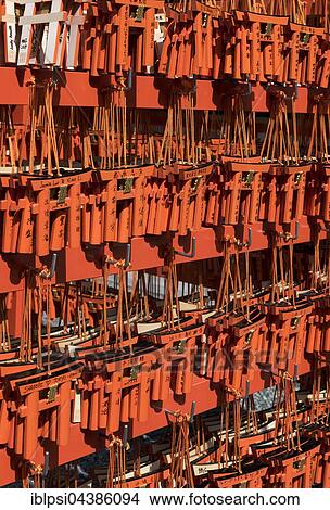 Ema wish plaques in the shape of orange torii gate, Fushimi Inari-taisha Shrine, Kyoto, Japan, Asia View Large Photo Image Picture - Ema wish plaques in the shape of orange torii gate, Fushimi Inari-taisha Shrine, Kyoto, Japan, Asia. Fotosearch