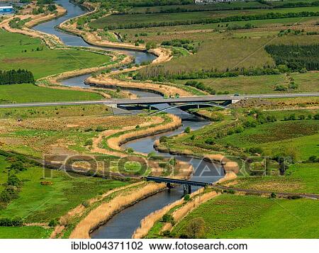 Stock Image - Ennis-Limerick Road, N18, River Fergus, County Clare, Ireland, Europe. Fotosearch