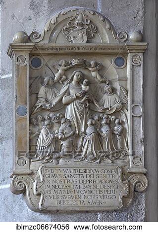 Epitaph of a protective mantle Madonna of the Gotzmann von der Büg family c. 1520, St. Michael Church, Neunkirchen am Brand, Franconia, Bavaria, Germany, Europe View Large Photo Image Stock Photograph - Epitaph of a protective mantle Madonna of the Gotzmann von der Büg family c. 1520, St. Michael Church, Neunkirchen am Brand, Franconia, Bavaria, Germany, Europe. Fotosearch