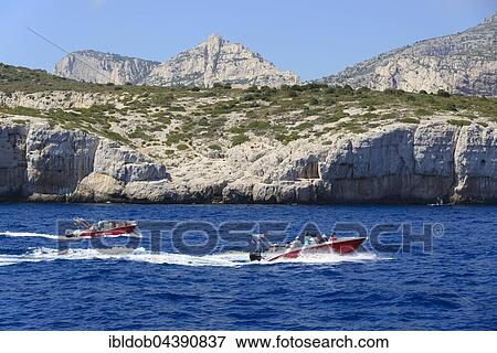 Excursion boats on the Mediterranean Sea, Calanques National Park, Marseille, Provence, Cote d'Azur, France, Europe View Large Photo Image Stock Photo - Excursion boats on the Mediterranean Sea, Calanques National Park, Marseille, Provence, Cote d'Azur, France, Europe. Fotosearch