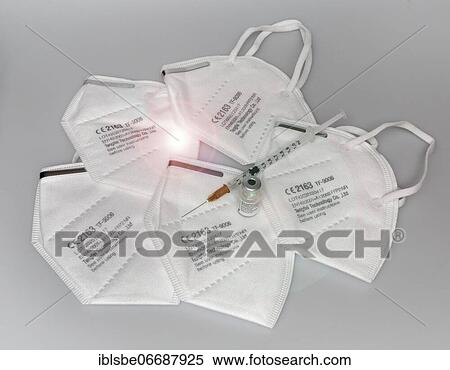 FFP2 masks, Corona masks for mouth and nose, Vaccine vial, Biontech, Pfizer, against Covid 19, Syringe View Large Photo Image Stock Photography - FFP2 masks, Corona masks for mouth and nose, Vaccine vial, Biontech, Pfizer, against Covid 19, Syringe. Fotosearch