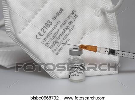 FFP2 masks, Corona protective masks, Vaccine vials from Pfizer-BioNTech, Pfizer, BIONTECH, against Covid 19, Syringe View Large Photo Image Stock Image - FFP2 masks, Corona protective masks, Vaccine vials from Pfizer-BioNTech, Pfizer, BIONTECH, against Covid 19, Syringe. Fotosearch