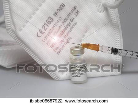 FFP2 masks, Corona protective masks, Vaccine vials from Pfizer-BioNTech, Pfizer, BIONTECH, against Covid 19, Syringe View Large Photo Image Stock Image - FFP2 masks, Corona protective masks, Vaccine vials from Pfizer-BioNTech, Pfizer, BIONTECH, against Covid 19, Syringe. Fotosearch