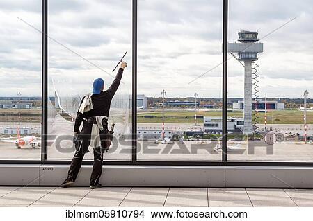 Final cleaning work at the new Berlin Brandenburg BER Willy Brandt Airport Terminal 1 in Berlin, Germany, Europe View Large Photo Image Picture - Final cleaning work at the new Berlin Brandenburg BER Willy Brandt Airport Terminal 1 in Berlin, Germany, Europe. Fotosearch