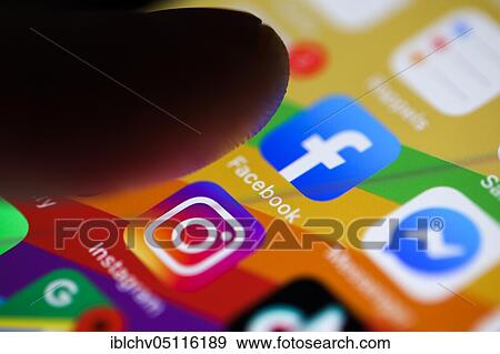 Finger about to press on the Facebook app icon on a smartphone, Belgium, Europe View Large Photo Image Stock Photo - Finger about to press on the Facebook app icon on a smartphone, Belgium, Europe. Fotosearch
