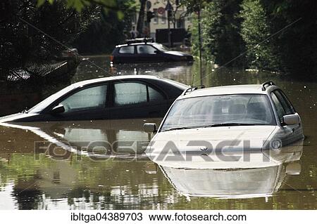 Flood, flooded road with cars, Bavaria, Augsburg, Germany, Europe View Large Photo Image Stock Image - Flood, flooded road with cars, Bavaria, Augsburg, Germany, Europe. Fotosearch