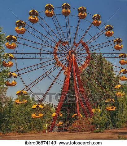 Stock Photo - Flying Ferris wheel, fairground, Pripyat, Lost Place, Chernobyl exclusion zone, Ukraine, Europe. Fotosearch