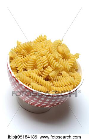 Fusilli, spiral noodles in bowl View Large Photo Image Stock Photography - Fusilli, spiral noodles in bowl. Fotosearch