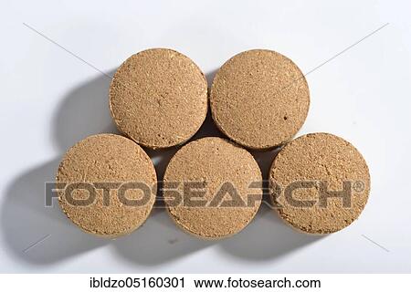 Stock Image - Galangal pressings, Hildegard von Bingen, Hildegard medicine. Fotosearch