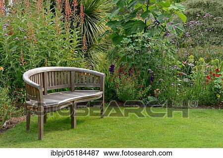 Garden bench, Great Britain, Wooden bench, Merriments Gardens, Hurst Green, County Kent, England View Large Photo Image Stock Photo - Garden bench, Great Britain, Wooden bench, Merriments Gardens, Hurst Green, County Kent, England. Fotosearch