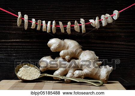 Ginger Tuber (Zingiber officinale) powder and discs hung up to dry View Large Photo Image Stock Photo - Ginger Tuber (Zingiber officinale) powder and discs hung up to dry. Fotosearch