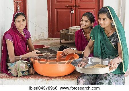 Girls, young women doing housework, Bera, Rajasthan, India, Asia View Large Photo Image Stock Photograph - Girls, young women doing housework, Bera, Rajasthan, India, Asia. Fotosearch