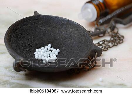 Globules in weighing pan View Large Photo Image Stock Photo - Globules in weighing pan. Fotosearch