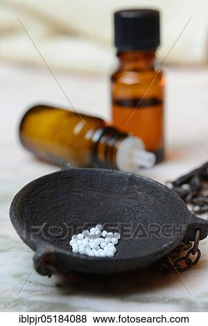 Globules in weighing pan View Large Photo Image Stock Photo - Globules in weighing pan. Fotosearch