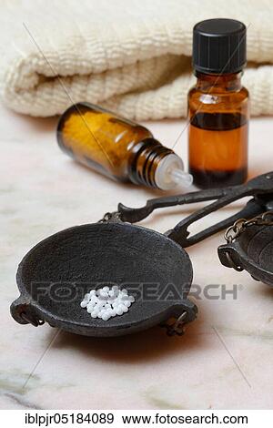 Globules in weighing pan View Large Photo Image Stock Photo - Globules in weighing pan. Fotosearch