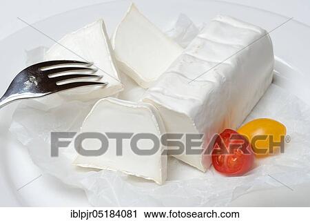Goat cheese with cherry tomatoes, goat cheese View Large Photo Image Stock Image - Goat cheese with cherry tomatoes, goat cheese. Fotosearch