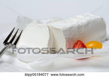 Goat cheese with fork and cherry tomatoes, goat cheese View Large Photo Image Stock Photo - Goat cheese with fork and cherry tomatoes, goat cheese. Fotosearch