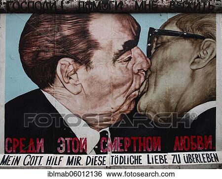 Graffiti brotherly kiss between Leonid Brezhnev and Erich Honecker, artist Dimitrij Vrubel, East Side Gallery, Berlin, Germany, Europe View Large Photo Image Stock Photograph - Graffiti brotherly kiss between Leonid Brezhnev and Erich Honecker, artist Dimitrij Vrubel, East Side Gallery, Berlin, Germany, Europe. Fotosearch