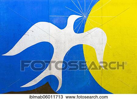 Graffiti Dawn Of Peace with white peace dove in front of sun, artist Salvatore de Fazio, mural at the East Side Gallery, Friedrichshain, Berlin, Germany, Europe View Large Photo Image Stock Image - Graffiti Dawn Of Peace with white peace dove in front of sun, artist Salvatore de Fazio, mural at the East Side Gallery, Friedrichshain, Berlin, Germany, Europe. Fotosearch