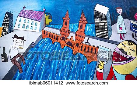 Graffiti Doin It Cool For The Eastside, with Spree and Oberbaum Bridge, artist Jim Avignon, mural at the East Side Gallery, Friedrichshain, Berlin, Germany, Europe View Large Photo Image Stock Image - Graffiti Doin It Cool For The Eastside, with Spree and Oberbaum Bridge, artist Jim Avignon, mural at the East Side Gallery, Friedrichshain, Berlin, Germany, Europe. Fotosearch