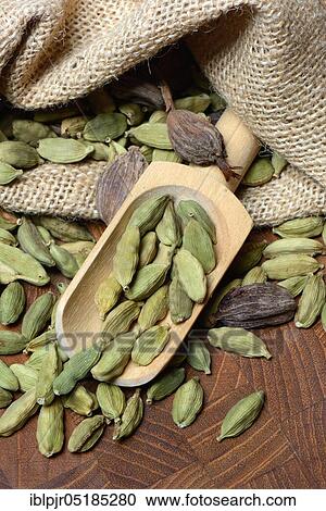 Green and black cardamom in jute bag, Elettaria cardamomum, Amomum subulatum View Large Photo Image Stock Image - Green and black cardamom in jute bag, Elettaria cardamomum, Amomum subulatum. Fotosearch