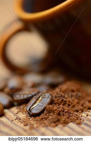Ground coffee and coffee beans View Large Photo Image Stock Photograph - Ground coffee and coffee beans. Fotosearch
