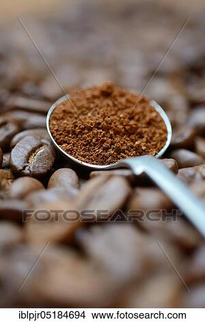Ground coffee in ladle View Large Photo Image Picture - Ground coffee in ladle. Fotosearch