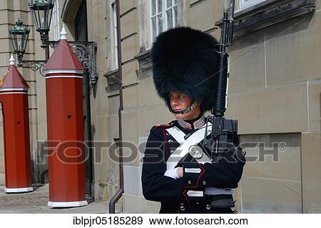 Guard at Amalienborg Castle, seat of government of the Danish Royal Family, Copenhagen, Denmark, Europe View Large Photo Image Stock Photo - Guard at Amalienborg Castle, seat of government of the Danish Royal Family, Copenhagen, Denmark, Europe. Fotosearch