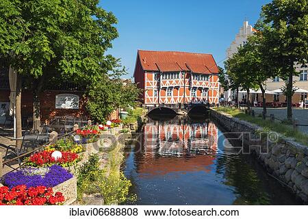 Half-timbered house vault over the watercourse Grube, Hanseatic City of Wismar, Mecklenburg-Western Pomerania, Germany, Europe View Large Photo Image Stock Photo - Half-timbered house vault over the watercourse Grube, Hanseatic City of Wismar, Mecklenburg-Western Pomerania, Germany, Europe. Fotosearch