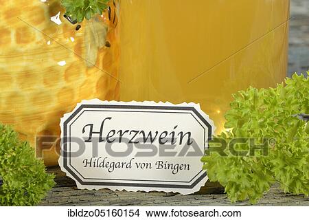 Heart wine, parsley wine (Petroselinum crispum), wine vinegar, white wine, Hildegard von Bingen View Large Photo Image Picture - Heart wine, parsley wine (Petroselinum crispum), wine vinegar, white wine, Hildegard von Bingen. Fotosearch