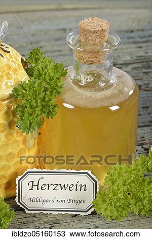 Heart wine, parsley wine (Petroselinum crispum), wine vinegar, white wine, Hildegard von Bingen View Large Photo Image Stock Image - Heart wine, parsley wine (Petroselinum crispum), wine vinegar, white wine, Hildegard von Bingen. Fotosearch