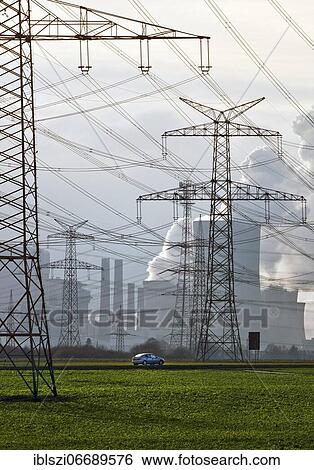 High-voltage pylons in front of the Neurath lignite-fired power plant, Grevenbroich, North Rhine-Westphalia, Germany, Europe View Large Photo Image Stock Photograph - High-voltage pylons in front of the Neurath lignite-fired power plant, Grevenbroich, North Rhine-Westphalia, Germany, Europe. Fotosearch
