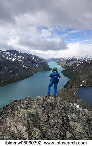 Stock Image - Hiking on the Besseggen Hike, ridge walk, right lake Bessvatnet, left lake Gjende, Jotunheimen National Park, Vågå, Innlandet, Norway, Europe. Fotosearch