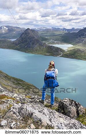 Stock Photography - Hiking on the Besseggen Hike, ridge walk, Lake Gjende, Jotunheimen National Park, Vågå, Innlandet, Norway, Europe. Fotosearch