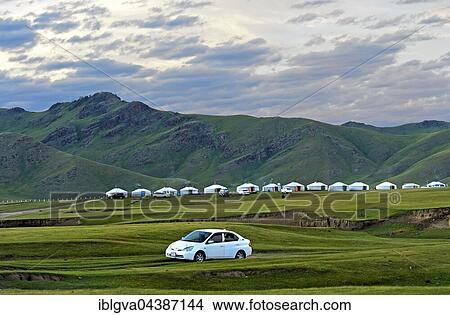 Hilly green countryside, jurts, nomad camp in Orkhon Valley, Mongolia, Asia View Large Photo Image Picture - Hilly green countryside, jurts, nomad camp in Orkhon Valley, Mongolia, Asia. Fotosearch