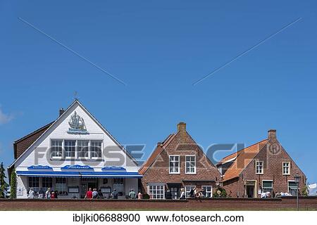 Historic houses at the fishing harbour, Greetsiel, Lower Saxony, Germany, Europe View Large Photo Image Stock Image - Historic houses at the fishing harbour, Greetsiel, Lower Saxony, Germany, Europe. Fotosearch