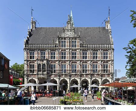 Stock Image - Historic town hall at the market, Dutch brick renaissance, Bocholt, Münsterland, North Rhine-Westphalia, Germany, Europe. Fotosearch
