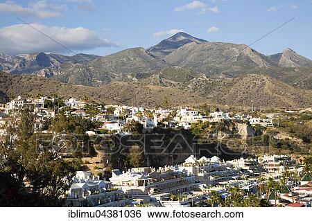 Holiday resort town of Nerja, Province of Málaga, Spain, Europe View Large Photo Image Stock Photograph - Holiday resort town of Nerja, Province of Málaga, Spain, Europe. Fotosearch