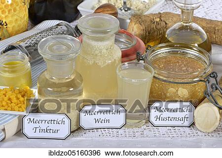 Horseradish wine (Cochlearia armoracia) Horseradish tincture, horseradish syrup, horseradish ointment, horseradish, farmer's mustard, meat cabbage, krien, maerk, mirch, pepper root, throat cleaner, wild radish View Large Photo Image Stock Photograph - Horseradish wine (Cochlearia armoracia) Horseradish tincture, horseradish syrup, horseradish ointment, horseradish, farmer's mustard, meat cabbage, krien, maerk, mirch, pepper root, throat cleaner, wild radish. Fotosearch