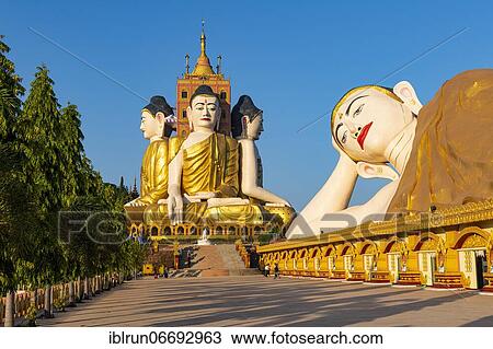 Stock Image - Huge sitting and reclining buddhas Ko Yin Lay Pagoda, Pupawadoy Monastery near Ye, Mon state, Myanmar, Asia. Fotosearch