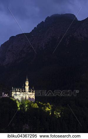 Illuminated Neuschwanstein Castle at night, Fussen, Allgäu, Bavaria, Germany, Europe View Large Photo Image Stock Photography - Illuminated Neuschwanstein Castle at night, Fussen, Allgäu, Bavaria, Germany, Europe. Fotosearch