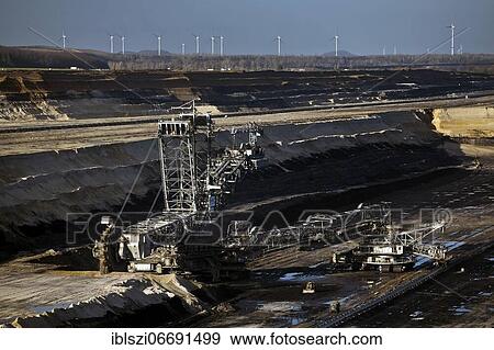 Inden opencast mine with stacker, opencast lignite mine, Inden, Rhenish lignite mining area, North Rhine-Westphalia, Germany, Europe View Large Photo Image Stock Photo - Inden opencast mine with stacker, opencast lignite mine, Inden, Rhenish lignite mining area, North Rhine-Westphalia, Germany, Europe. Fotosearch