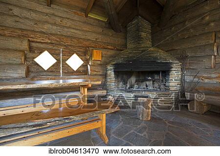 Stock Image - Interior of a hiker's cabin with large fireplace, North Karelia, Finland, Europe. Fotosearch