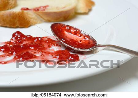 Jam and slice of braided butter, raspberry jam View Large Photo Image Picture - Jam and slice of braided butter, raspberry jam. Fotosearch