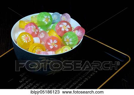 Stock Image - Japanese sweets in bowl, candy. Fotosearch